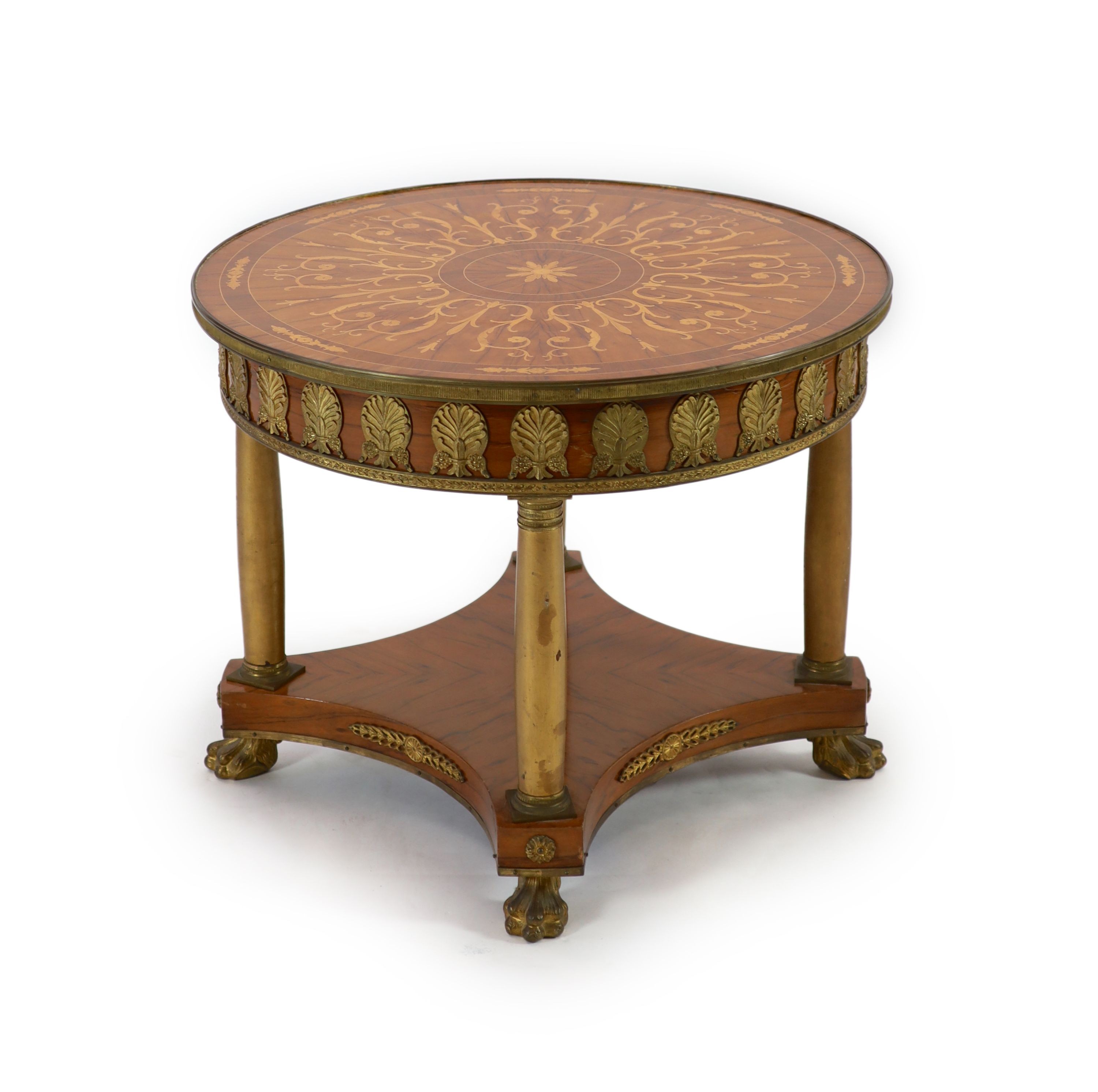 A French empire style ormolu mounted marquetry centre table Diam.81cm H.65cm